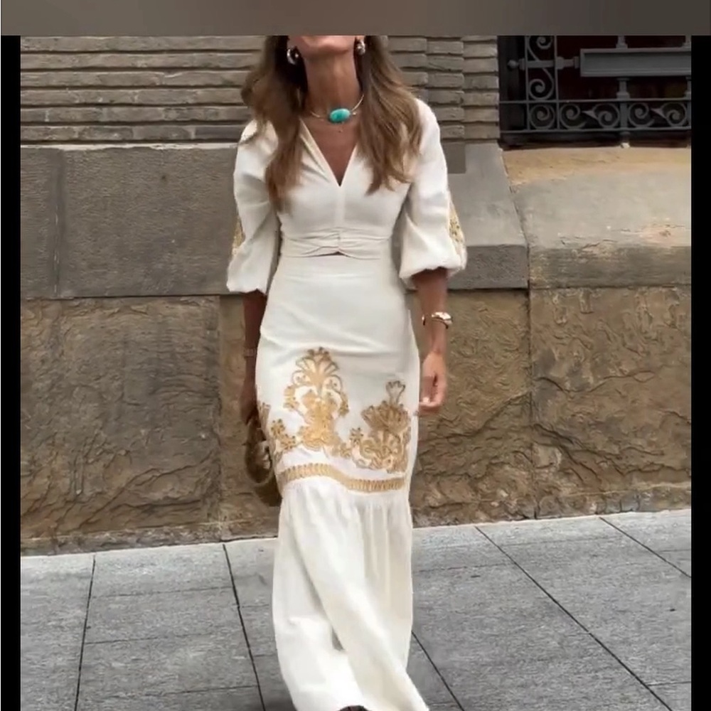 Top and bottom outfit, white and gold. Material is light weight soft cotton.